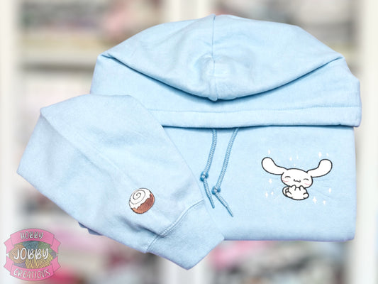 Flying Dog Friend Embroidered Hoodie with Cinnamon Roll Sleeve Embellishment